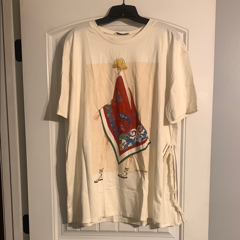 Cream Graphic T-Shirt with Red and Blue Design